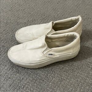 Vans women’s white Slip-On Sneakers